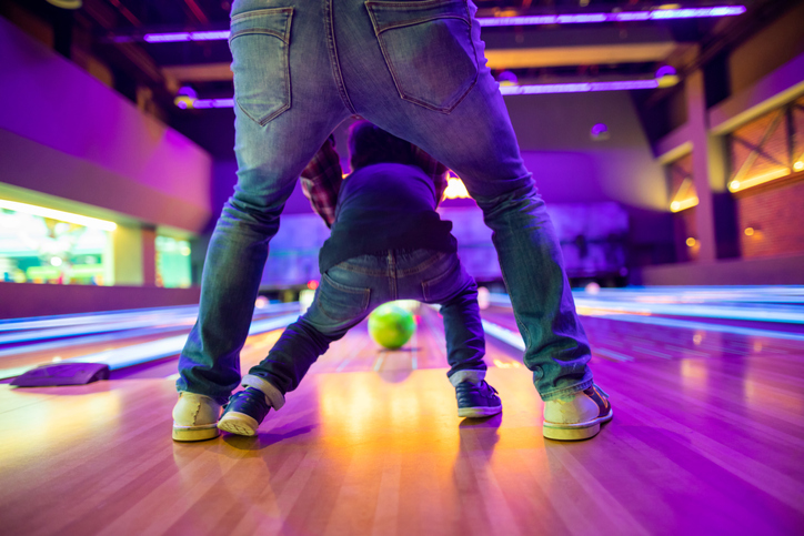 Father and son at myrtle beach bowling alley